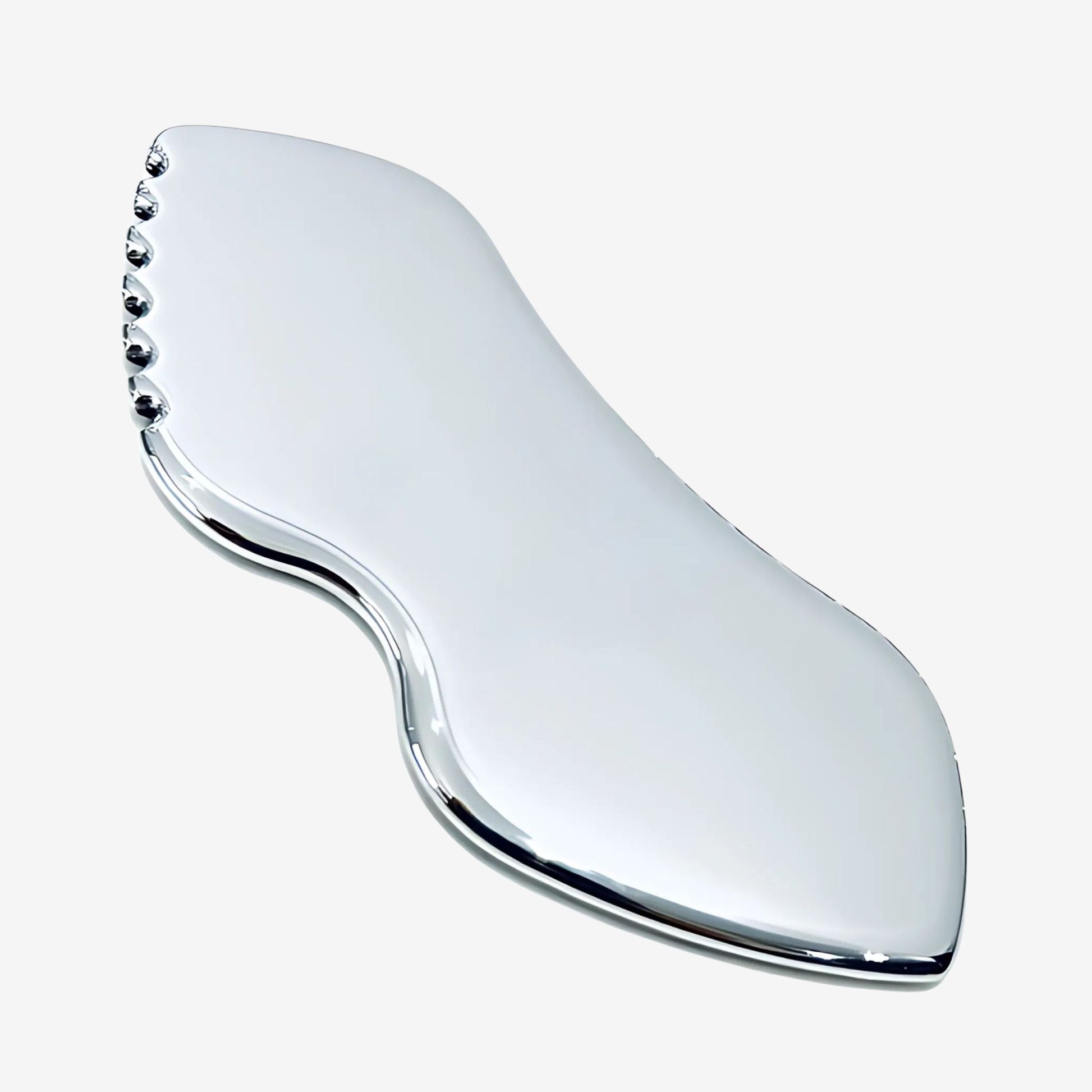 Silver, stainless steel gua sha face massager.